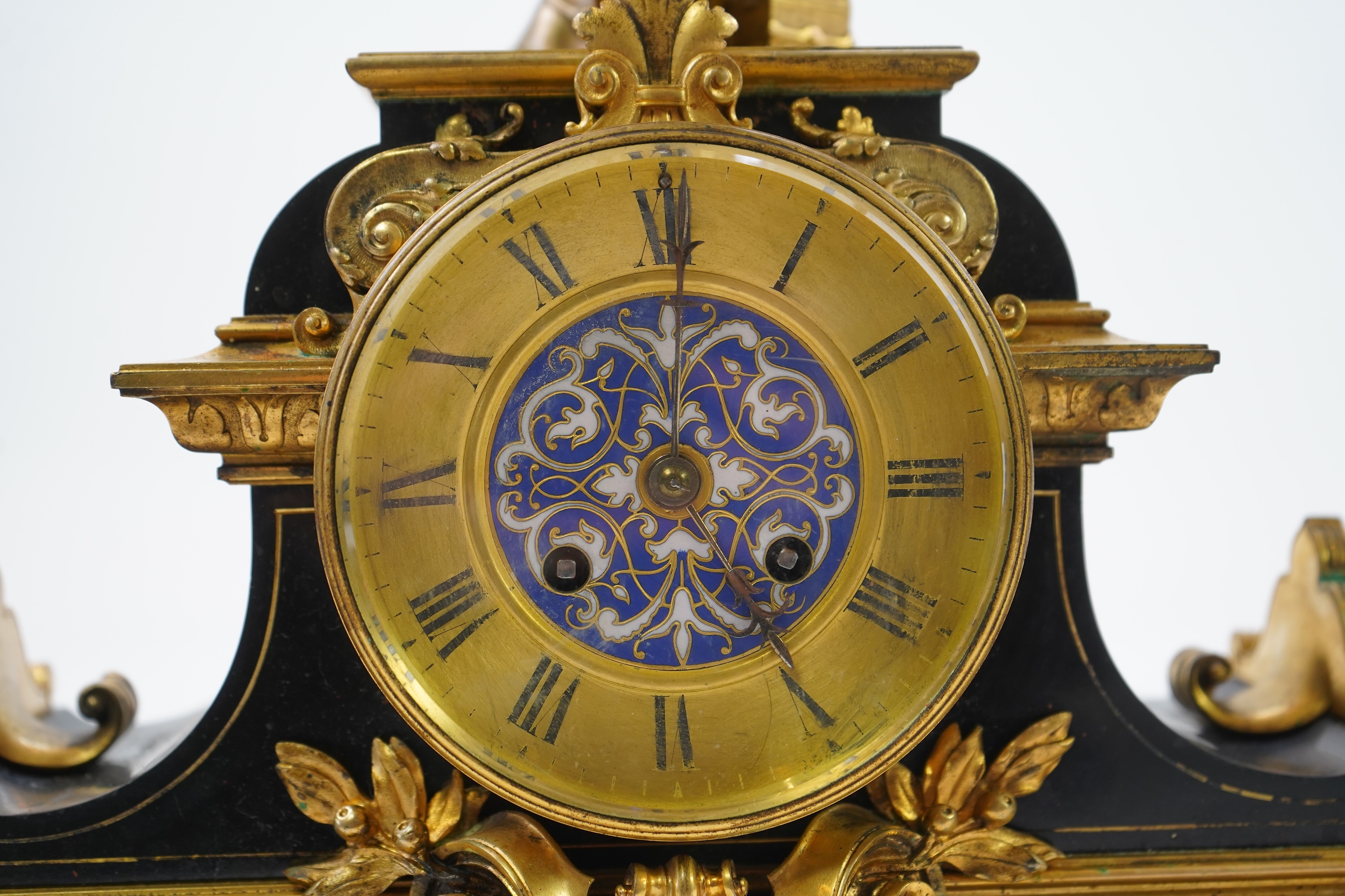 A French gilt bronze figural clock garniture, late 19th century